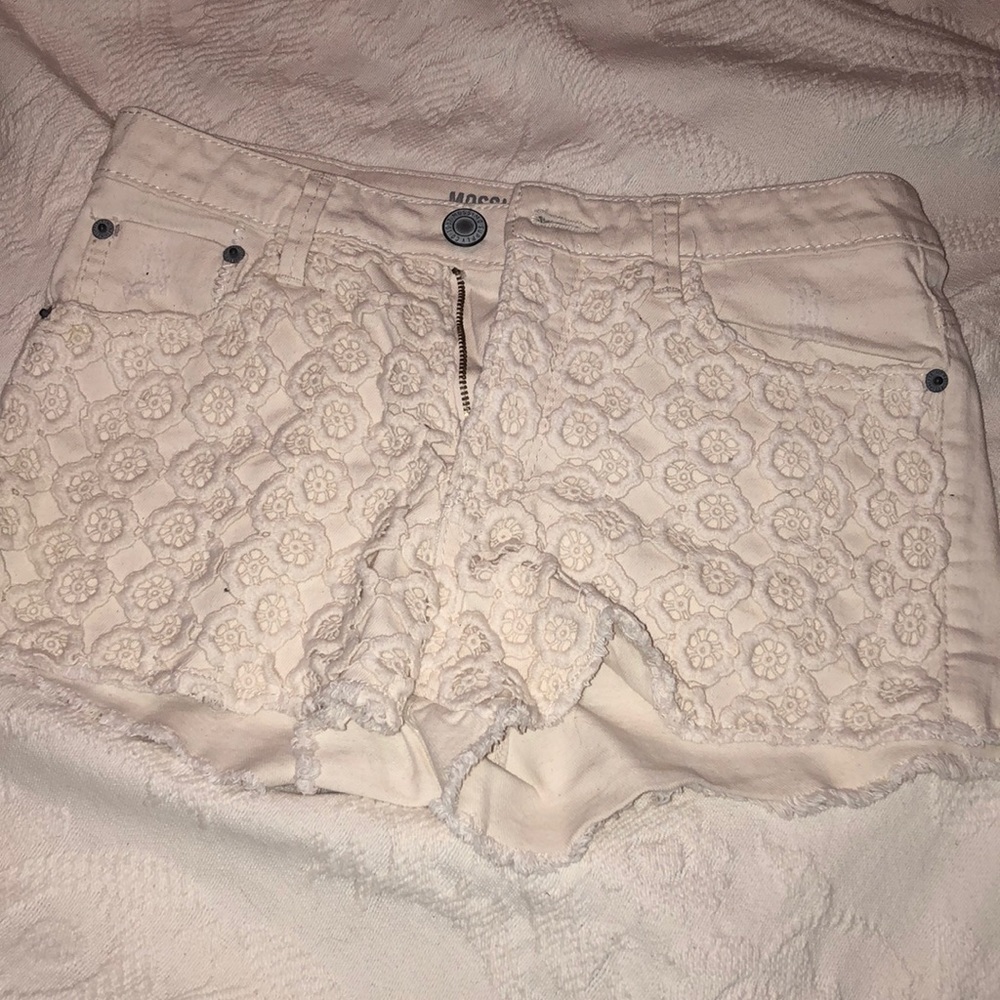 Cream shorts with floral embroidery